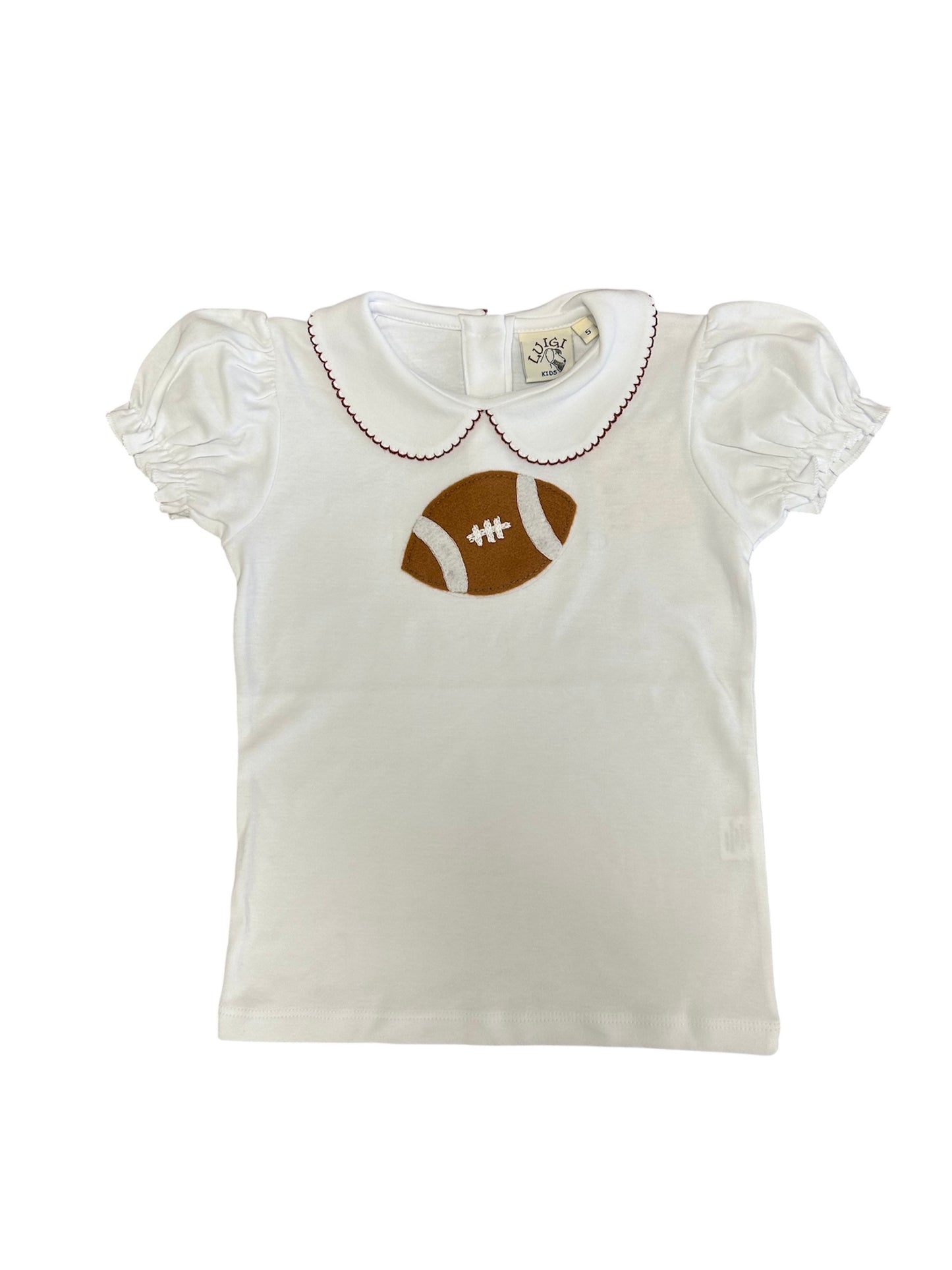 White blouse with football