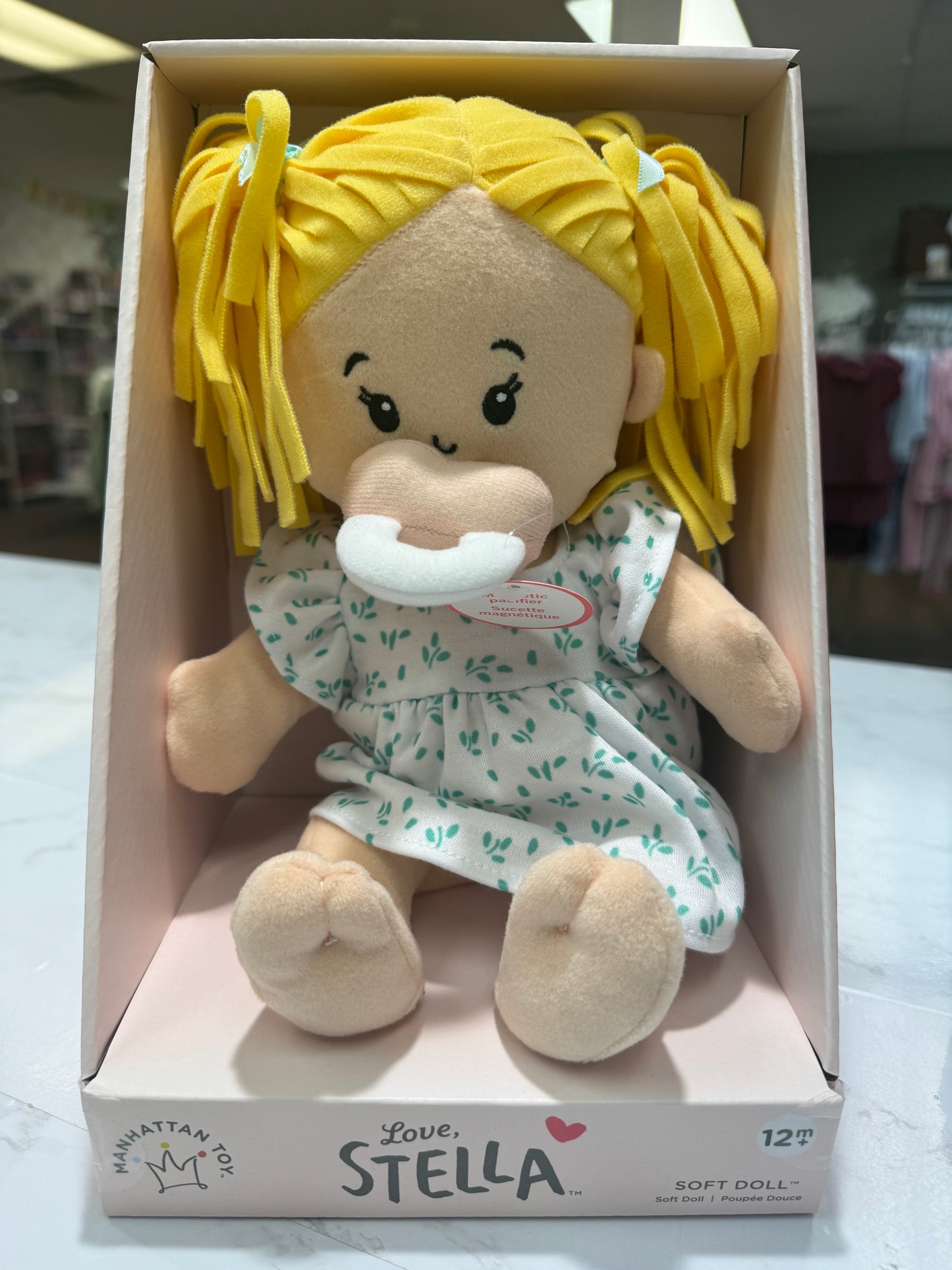 Stella doll peach with blonde pigtails