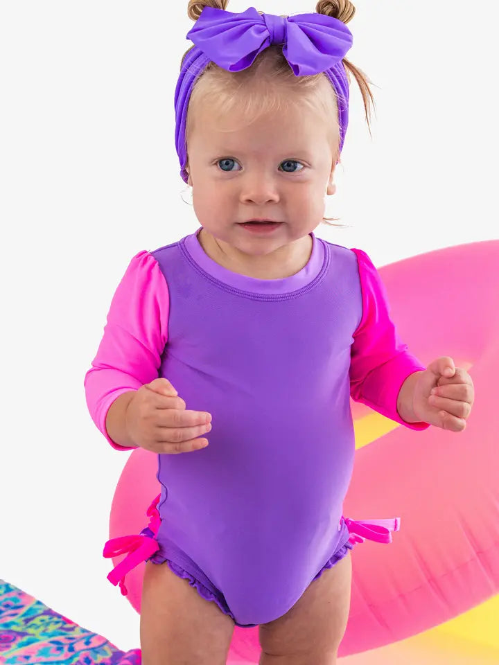 Neon Purple one piece rash guard swimsuit