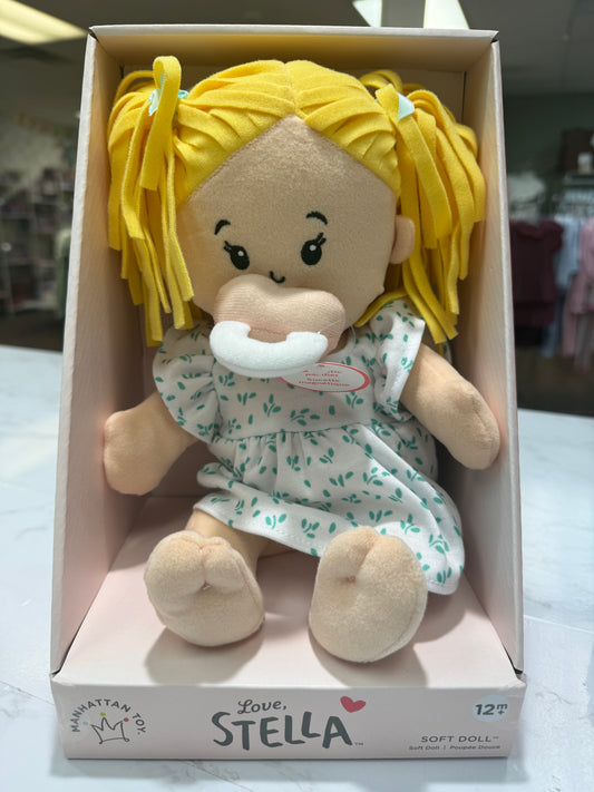 Stella doll peach with blonde pigtails