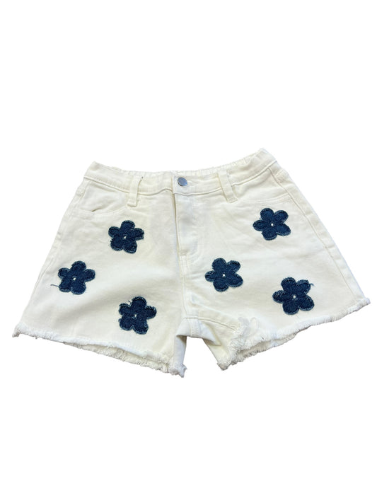 White denim shorts with flower